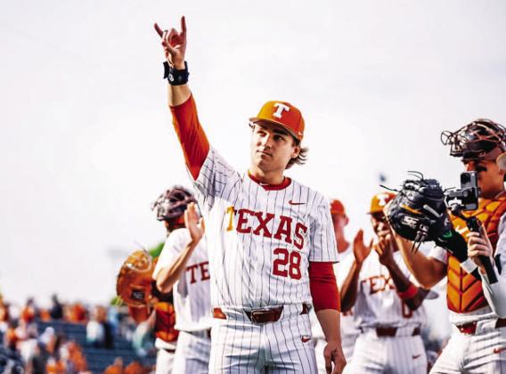 Whitehead throws the Horns up to the fans at Disch-Falk Field after the win. COURTESY PHOTO | TEXAS ATHLETICS