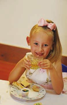 Five-year-old Reagan Groves sips her apple juice “tea” while she enjoys socializing at the Teddy Bear Tea. JOYCESARAH MCCABE | DISPATCH RECORD