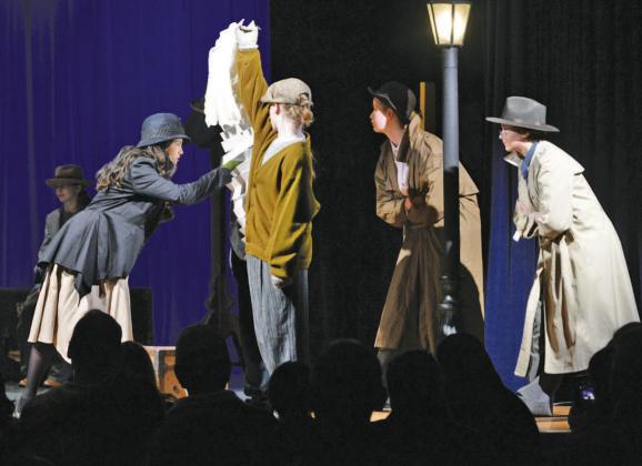 A scene from “The 39 Steps Even More Abridged” is performed by Lampasas Middle School theater students. ERICK MITCHELL | DISPATCH RECORD
