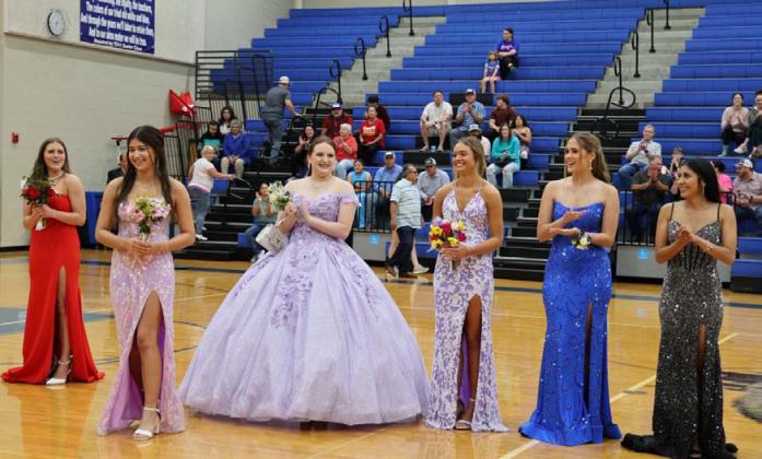 The nominees for LHS Prom Queen, Arielle Aguirre, Jamie Ball, Morgan Bobo, Keely Cavel and Kenzie Roberts, cheer for this year’s winner, Liliana Miller. JOYCESARAH MCCABE | DISPATCH RECORD