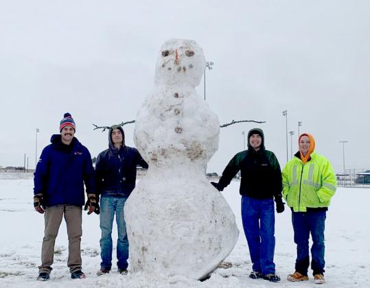.Jared Payne, Shane Wolfe, Callan Wolfe and James Sommerville built this snowman, estimated to be 10 feet tall, at the sports park on FM 580 West.