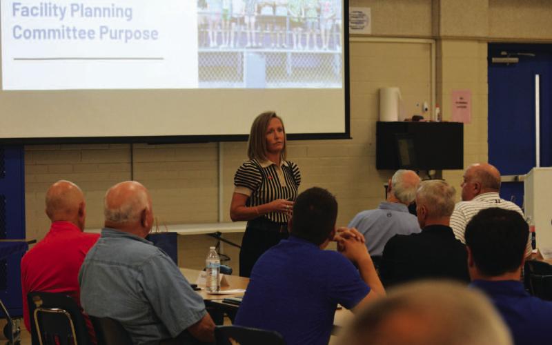 Kelly Trompler of the firm WRA Architects offers a PowerPoint presentation Monday at the Lampasas Middle School cafeteria for the Facilities Planning Committee. Committee members will make a recommendation later this year on how the Lampasas ISD could pursue bond funding for upgraded facilities. ERICK MITCHELL | DISPATCH RECORD