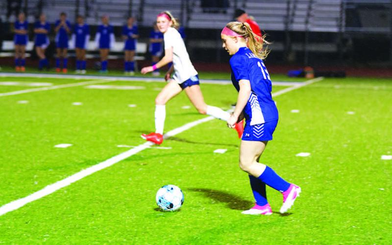 HUNTER KING | DISPATCH RECORD Denver Conklin dribbles through the midfield against China Spring.
