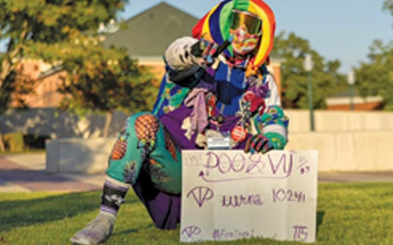 Ace Brooks in his Purple Poo attire before he was unmasked last month. COURTESY PHOTO