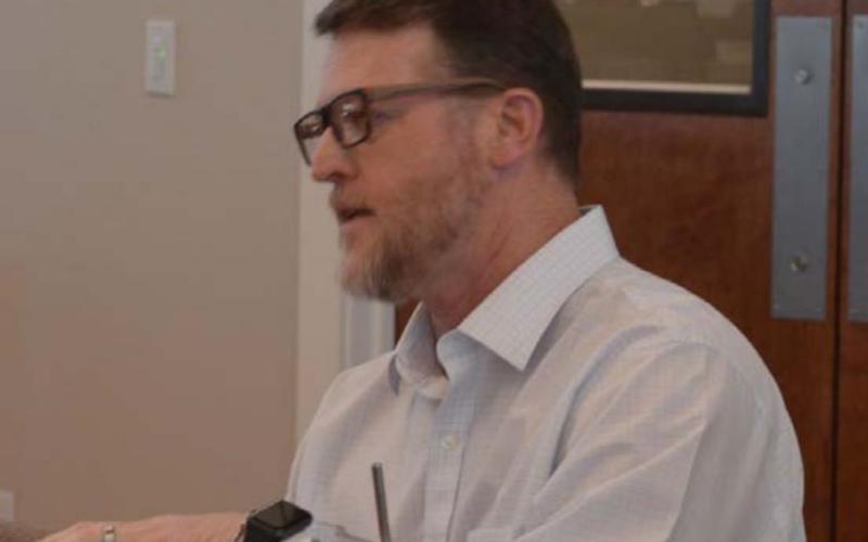 Lampasas Assistant City Manager Ryan Ward goes over city projects during a roundtable session held Monday. MONIQUE BRAND | DISPATCH RECORD