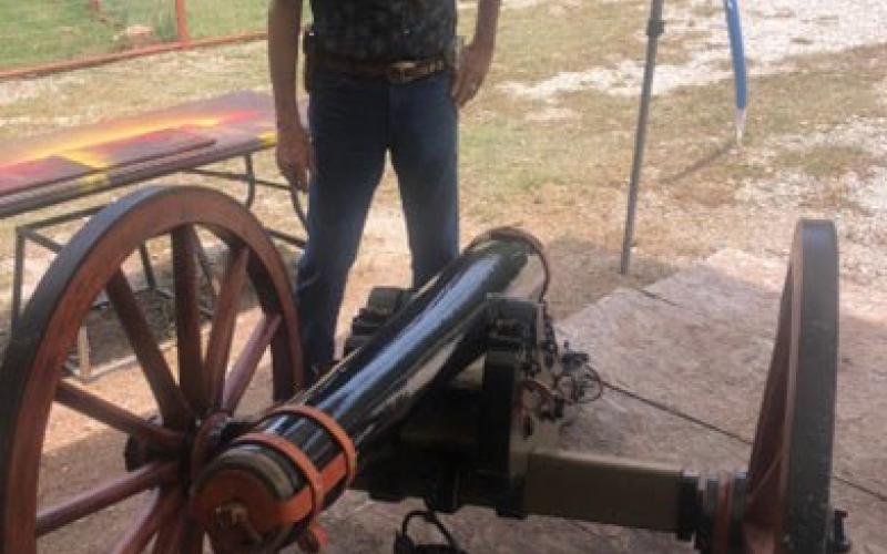 SCV member Ross J. Cox Sr. examines a half-scale cannon near Brownwood. The Saltworks Camp No. 2353 plans to acquire a full-scale model later this year. MICHAEL OLIVER | COURTESY PHOTO