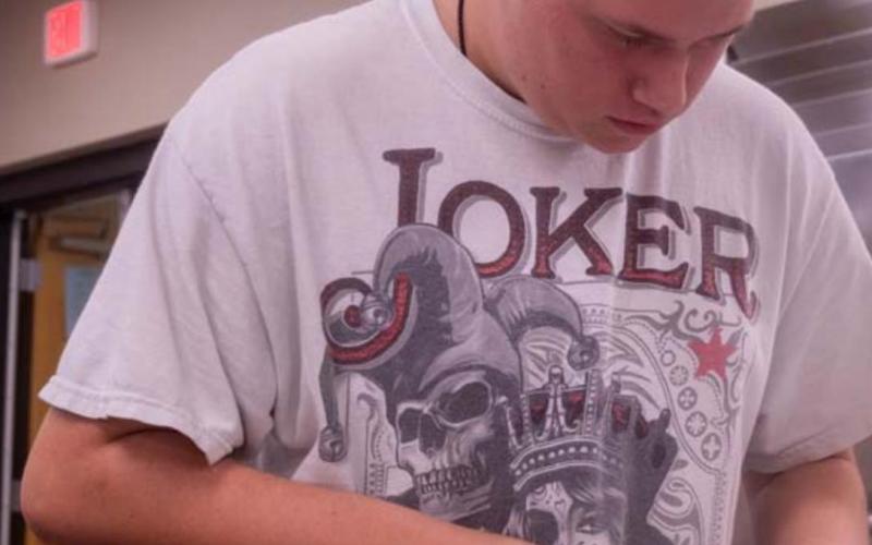 Dyllan Foppiano prepares potatoes at the Lampasas High culinary center. MICHAEL CUVIELLO | DISPATCH RECORD