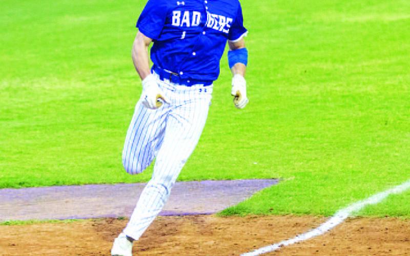 Jonathan Bowling comes across home plate during the Badgers’ game against Marble Falls. HUNTER KING | DISPATCH RECORD
