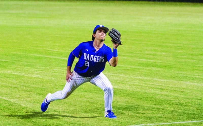 Anthony Dimas looks a pop up into his glove in Tuesday’s contest. HUNTER KING | DISPATCH RECORD