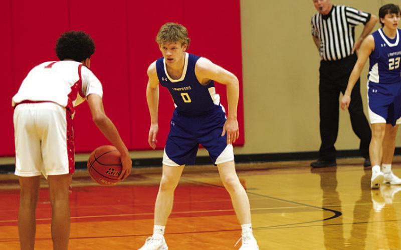 HUNTER KING | DISPATCH RECORD Peyton Sisson defends the ball during the game against Salado.