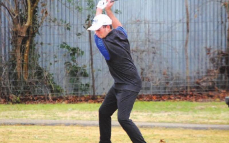 Peyton Spore tees off on No. 7 Monday morning. HUNTER KING | DISPATCH RECORD