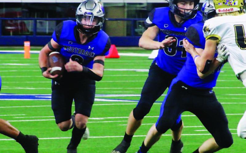 Westbrook sophomore Grayson Jeffrey looks for running room during the Dec. 14 championship game. MASON HINES | DISPATCH RECORD