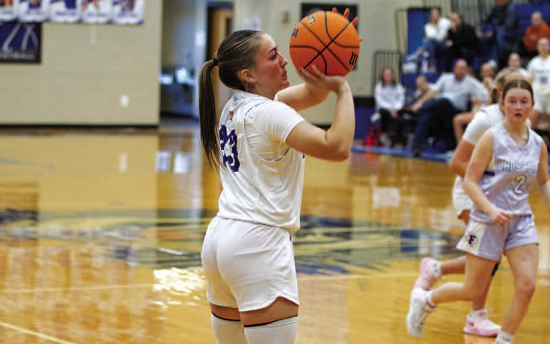Payton Crawford shoots a three-point shot during Tuesday afternoon’s contest. HUNTER KING | DISPATCH RECORD
