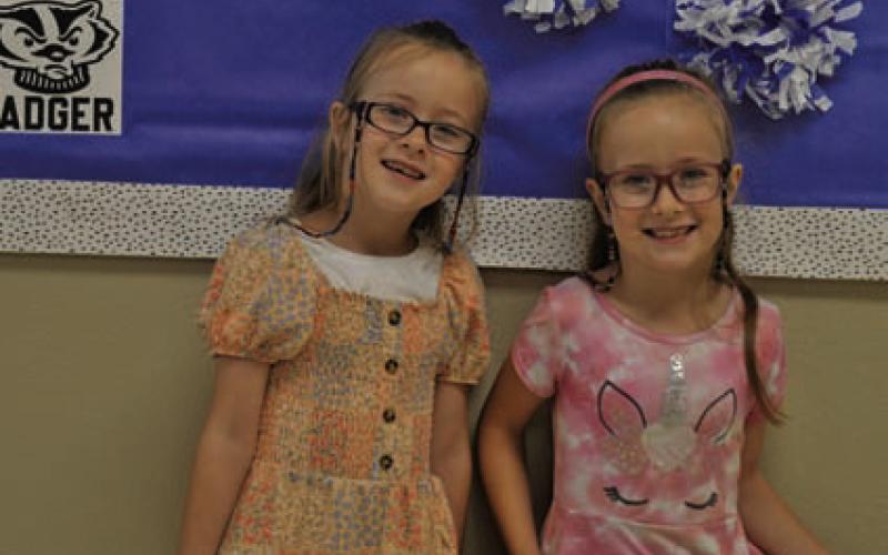At left, Sadie and Sara Kennington are the classic pair of inseparable twins. ERICK MITCHELL | DISPATCH RECORD