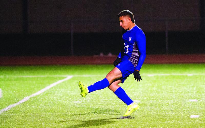 Juan Munoz scores his penalty kick at the end of the match. HUNTER KING | DISPATCH RECORD