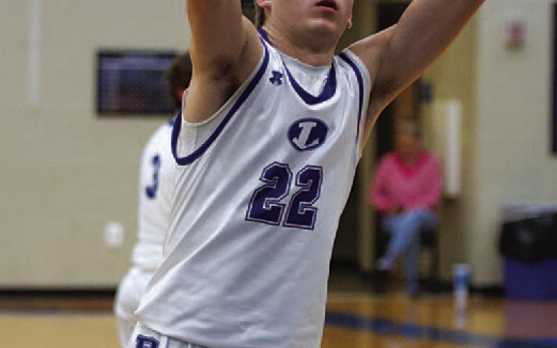 Jax Pratus releases a free throw. HUNTER KING | DISPATCH RECORD