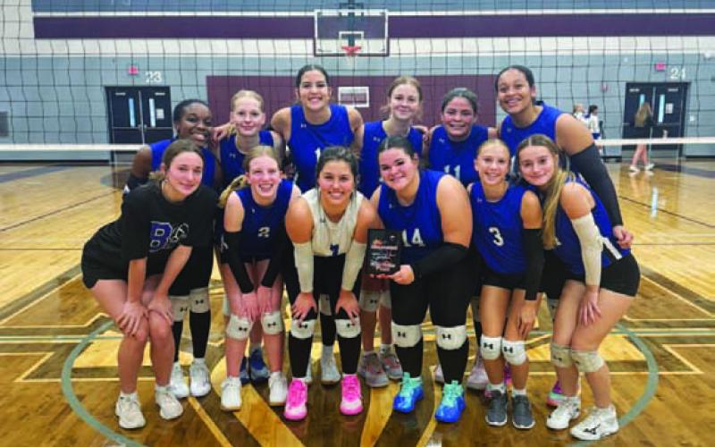 COURTESY PHOTO Lady Badger volleyball shows off the team’s plaque earned at the Killeen tournament over the weekend.