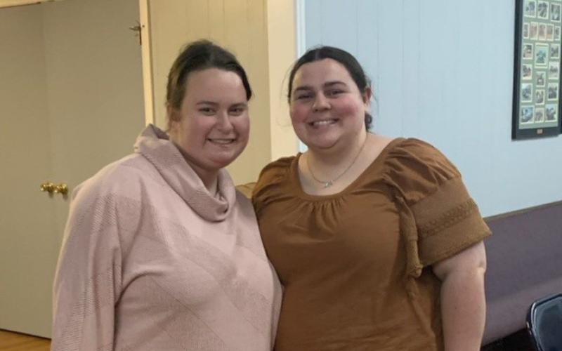 Holly Hines gave a presentation on how to use the app GroupMe, which will allow the club to have an easy-to-use group chat. Laura Beth Henniger joined in the festivities. COURTESY PHOTO