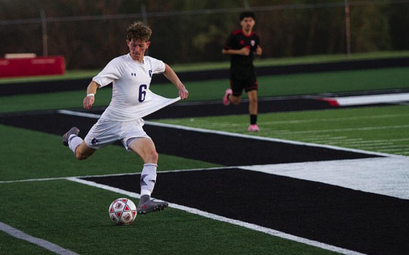 HUNTER KING | DISPATCH RECORD John Keyes plays a ball from the right wing against Life Waxahachie.
