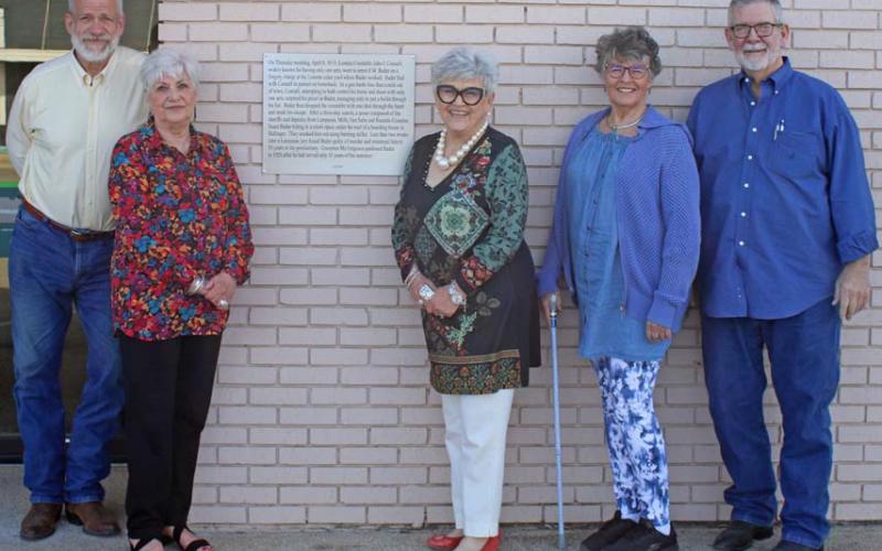 Mason hines | dispatch reacord Local historians gathered last week to present the commemorative plaque and mounted it at the Cadence Bank building in Lometa. Left to right are Boyce Cabaniss, Clydell Wallace, Janie Potts, Peggy Wolfe and Tom Welch.