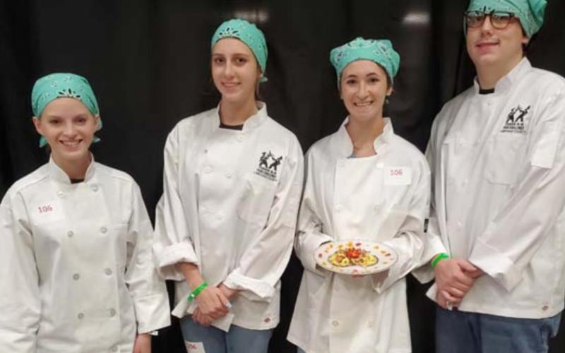 The Lampasas 4-H Food Challenge team captured eighth place in the appetizer division at the recent Texas 4-H Roundup. Team members, from left to right, are Allison Martin, Abi Stewart, Mikaila Fortner and Kyle Tomlinson. COURTESY PHOTO