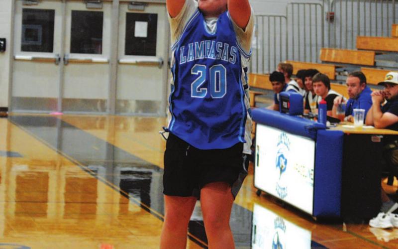 Aidan Nuckles lets a three ball go on his way to 35 points Tuesday. HUNTER KING | DISPATCH RECORD