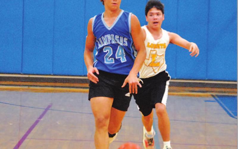 Hagen Oncken brings the ball up the floor against Lometa during this week’s summer league action. HUNTER KING | DISPATCH RECORD