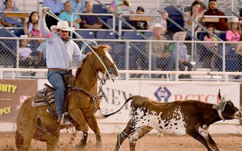 Team ropers set record at Pecos Rodeo