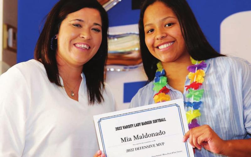 Coach Jessica Harborth, left, poses with Mia Maldonado holding her Defensive MVP award. CHRIS MILES | COURTESY PHOTO
