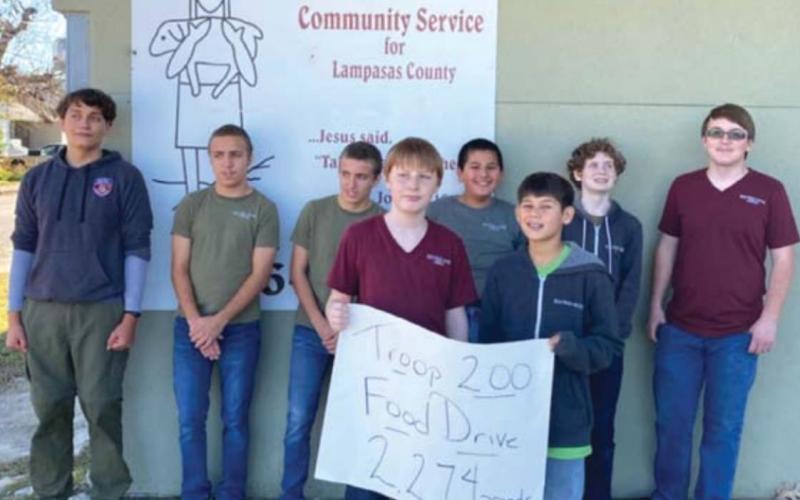 Boy Scout Troop 200 is shown last year after it dropped off 2,274 pounds of donated nonperishable food items at Lampasas Mission. Pictured, left to right, are Luke Coonrod, Jimmy McAnally, Daniel McAnally, Grayson Eddinger, Pablo Cortez, Jayton Saucedo, Jace Silsby and Tommy Bushong. courtesy photo