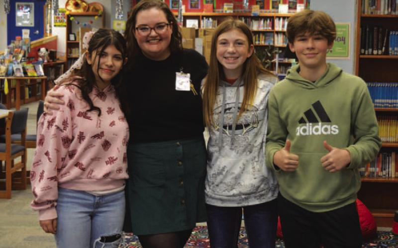 The Lampasas Middle School theatre director Kelli Cox stands between LMS students, left to right, Zoey Rivas, Holley Wakeman, and Grady Groves. ERICK MITCHELL | DISPATCH RECORD