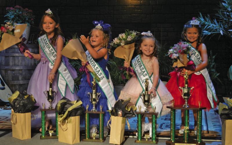 Little Miss Spring Ho court members pose for photos after being crowned during Monday’s festivities. They are, from left to right, third runner-up Kylie Stone, second runner-up Berklee Tucker, first runner-up Berkley Shuffler and Little Miss Spring Ho Lyla Butts. ERICK MITCHELL | DISPATCH RECORD