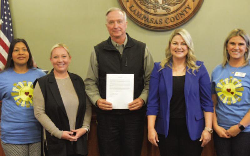 Representatives of the Hill County Children’s Advocacy Center and Lampasas CPS Board pose for a photo after last week’s proclamation naming April as Child Abuse Prevention Month. From left to right are HCCAC Family Advocate/Therapy Support Specialist Erika Bernabe, CPS Board Vice President Janda McQueen, Lampasas County Judge Randy Hoyer, CPS Board Treasurer Crystal Banks and HCCAC Education Outreach Coordinator Erica Melton. ERICK MITCHELL | DISPATCH RECORD