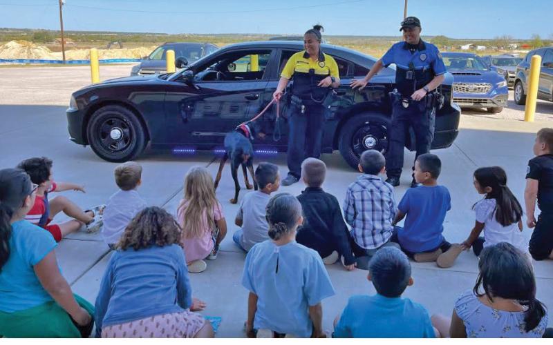 Lometa Police Chief Melissa Cantu and Police Officer Kenny Murray speak to Lometa fourthgraders during Career Day. mason hines | dispatch record