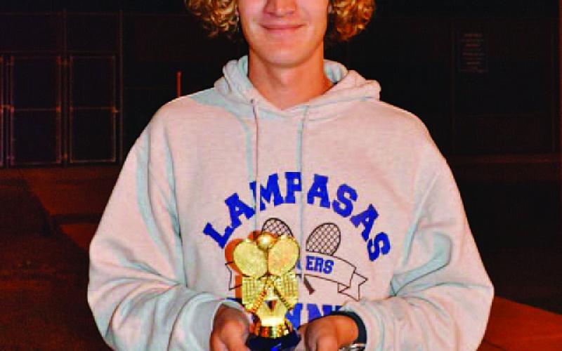 Luke Rogers holds his trophy after winning first place at the Georgetown tournament last week. COURTESY PHOTO | KENNETH PEISER