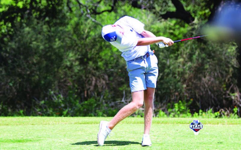 Riley Oestreich swings through a tee shot during the second day of the state golf tournament on Tuesday. HUNTER KING | DISPATCH RECORD
