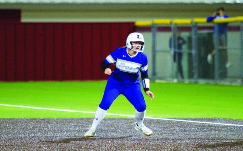 Kamryn Kothmann shuffles off first base against Salado. HUNTER KING | DISPATCH RECORD