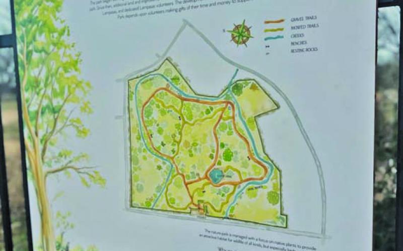 One of the five new signs installed at the Cooper Spring Nature Park, this sign provides information on the history of the park and the trails that lie within. COURTESY PHOTO