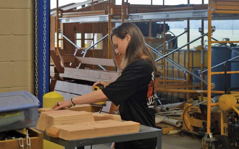 Junior Sadey Smith stays busy during construction class last Thursday. erick mitchell | dispatch record