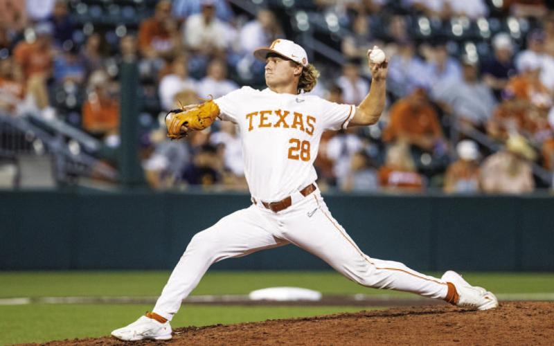 Ace Whitehead throws a pitch during a game against West Virginia last season. COURTESY PHOTO | TEXAS ATHLETICS