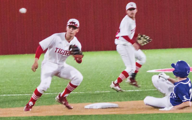 Nate Borchardt steals second base in the seventh inning. He had two hits, a run and an RBI in that inning and earned the save as relief pitcher. JEFF LOWE | DISPATCH RECORD