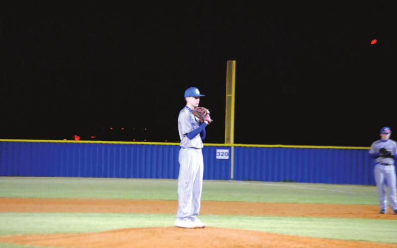 Jonas Anderson prepares to throw a pitch during a scrimmage against Ellison earlier this season. HUNTER KING | DISPATCH RECORD
