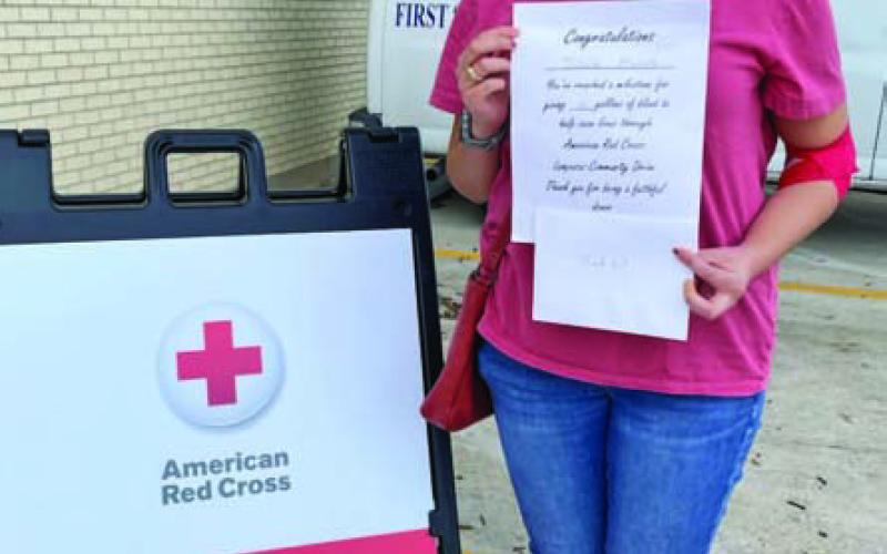 Julieta Munoz received a certificate recognizing her for reaching the blood donor milestone of 2 gallons. COURTESY PHOTO