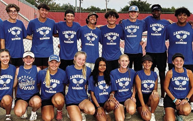 The tennis team poses for a photo after winning the bi-district round on Tuesday. COURTESY PHOTO | KENNETH PEISER