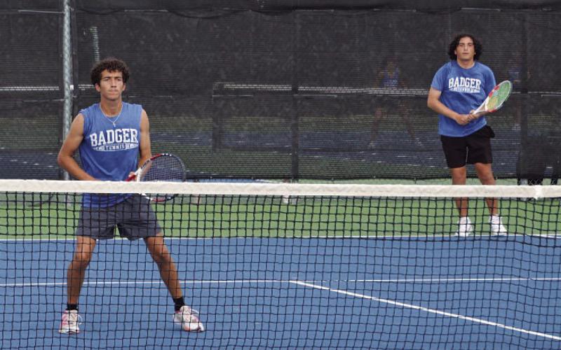 COURTESY PHOTO | KENNETH PEISER Brock Messinger, front, and Jacob Pronovost await a serve during the match against Brownwood.