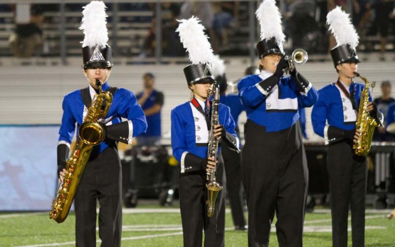 Band members, from left to right, include Nathan Greenway on the baritone saxophone, Dakota Hayden on the bass clarinet, Connor Downs, playing trumpet, and Luke Rogers on saxophone. hunter king | Dispatch Record