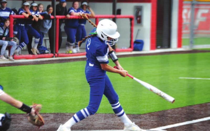 Kayli Syx swings at a pitch during the Lady Badgers’ most recent contest with Salado last week. HUNTER KING | DISPATCH RECORD
