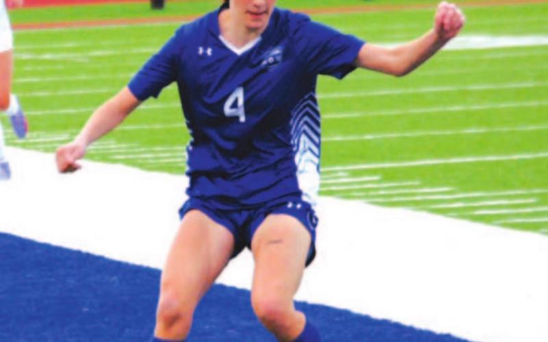 Nyla Long controls the ball near the end line before passing to a teammate during Tuesday’s game. HUNTER KING | DISPATCH RECORD