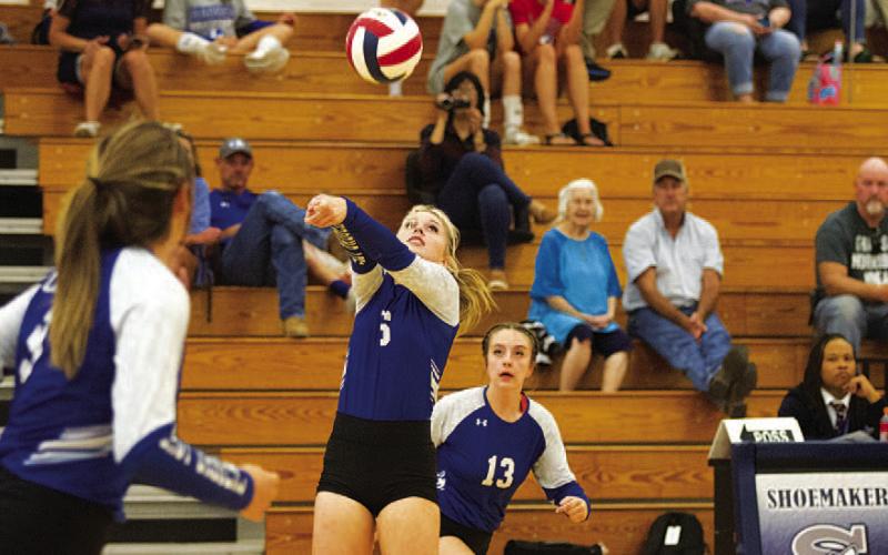 Scout Barton plays a pass during the first set of Tuesday’s game against Shoemaker. HUNTER KING | DISPATCH RECORD