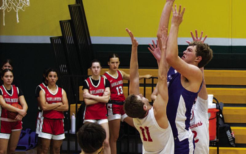 Beau Patterson goes up through contact. He was an all-tournament player last weekend. HUNTER KING | DISPATCH RECORD